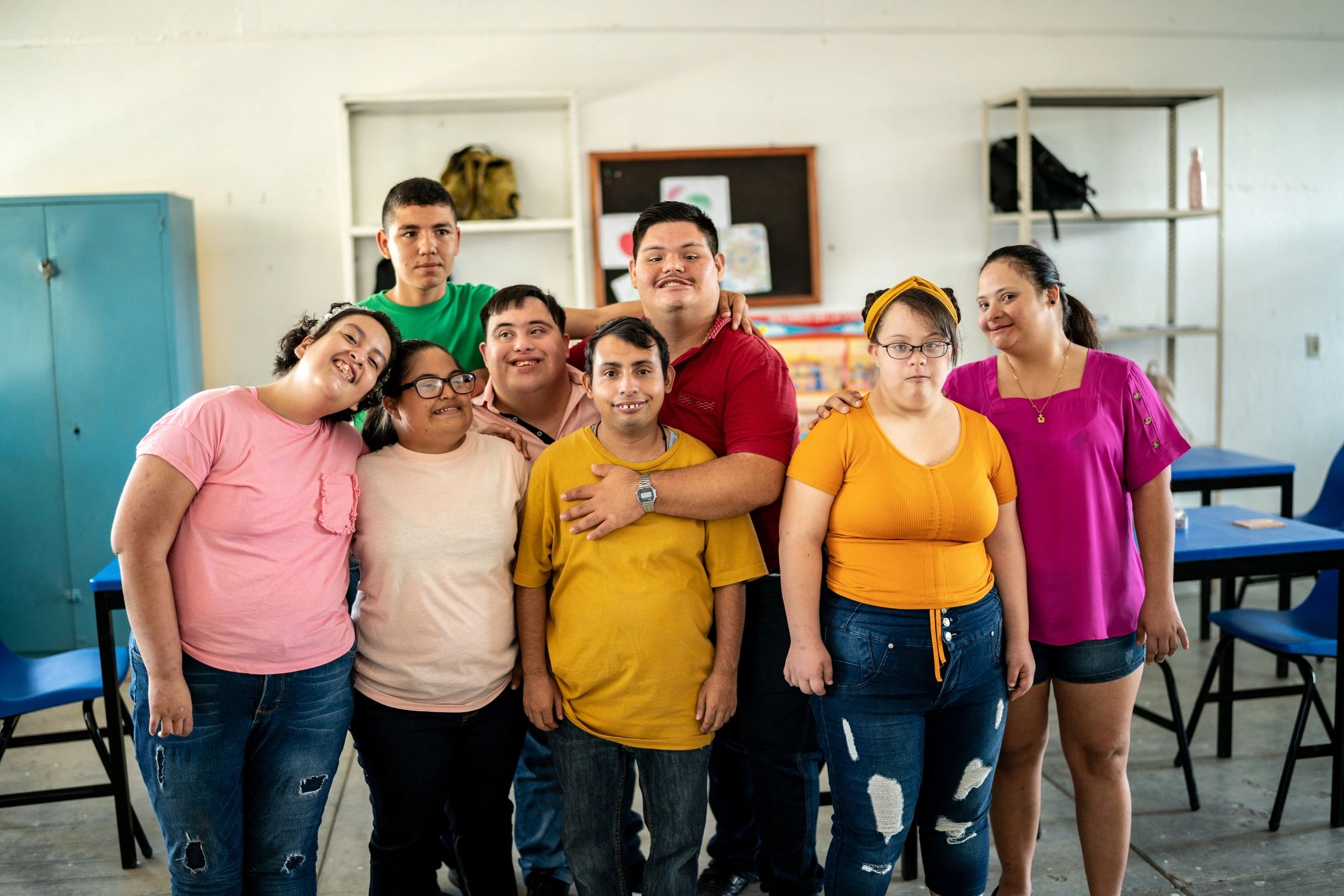 Diverse group of young people in community center